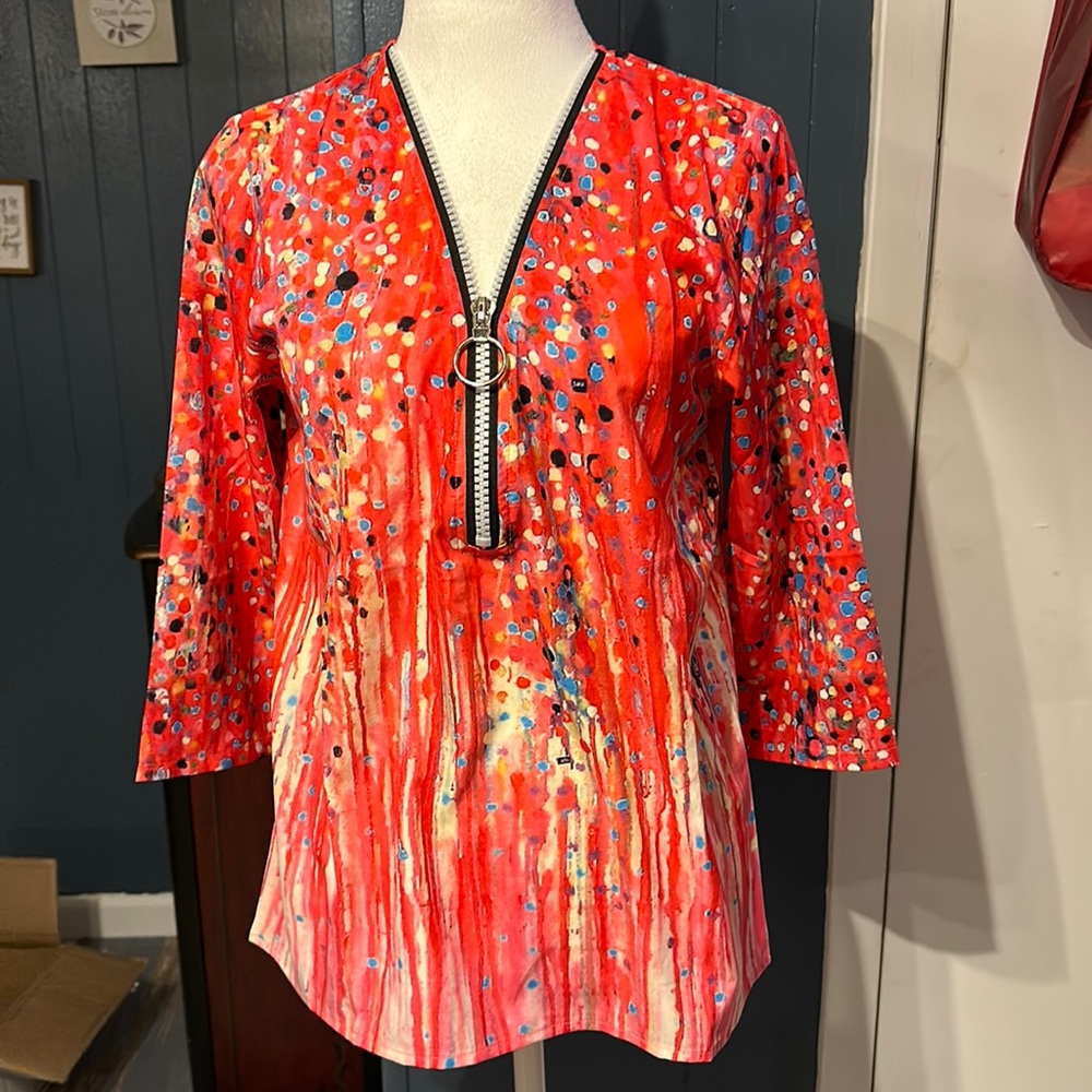 Made with Love size Small women’s blouse vibrant orange splashes of color.